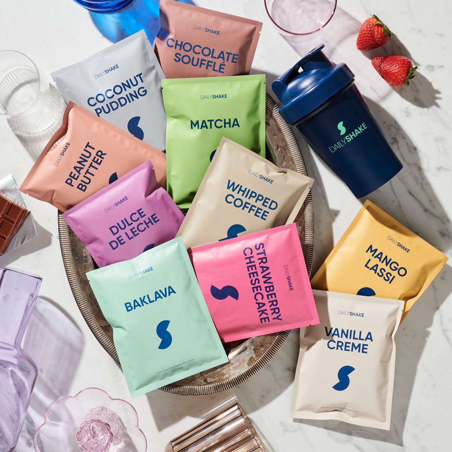 Daily Shake flavours and navy shaker bottle